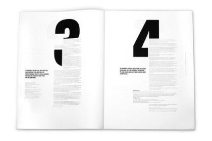 Uppslag med svart geometrisk typografi och asymmetriska textblock